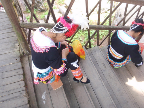 Yao young ladies take their sewing skills seriously.